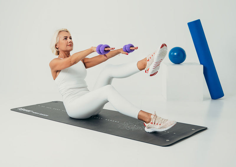 Jolanta Wrist weight workout on mat
