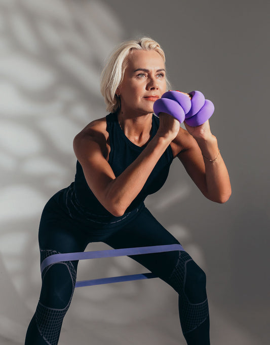 Jolanta Wrist weight workout squat