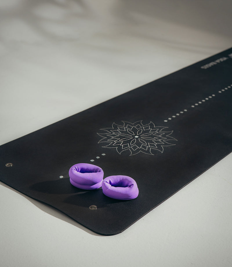 wrist weights on mat